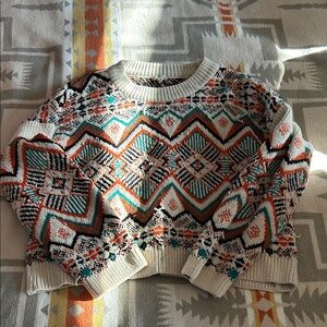 Distressed cropped sweater